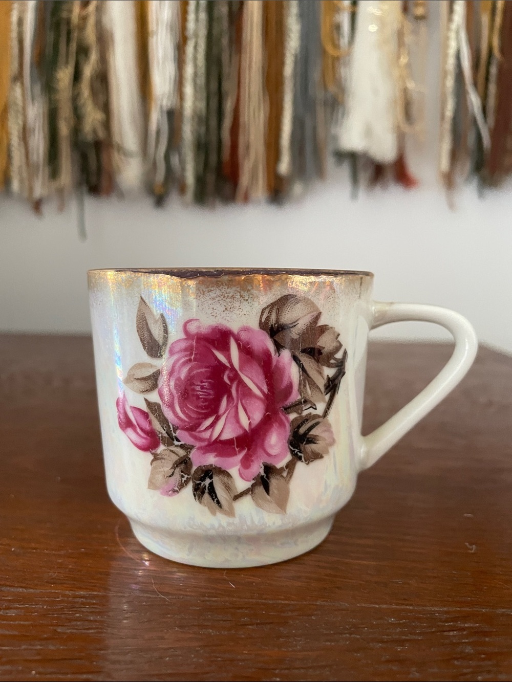 Iridescent Porcelain Teacup with Pink Rose Motif